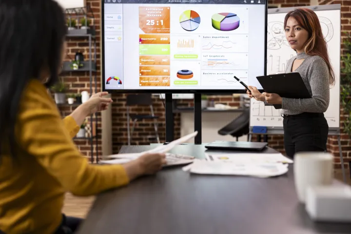 From Chaos to Clarity: Using Custom Dashboards for Business Growth in 2025 5 illustrate 2 women design custom dashboards