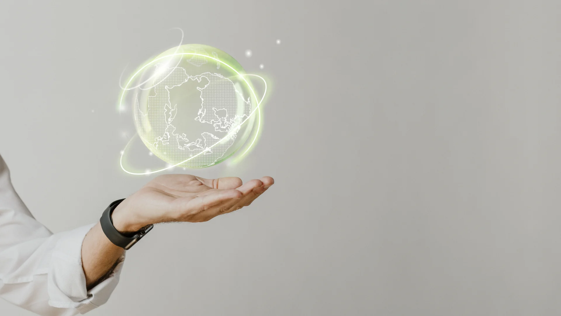 Image shows a tech world on a leader hand as a symbol of responsible AI use in business