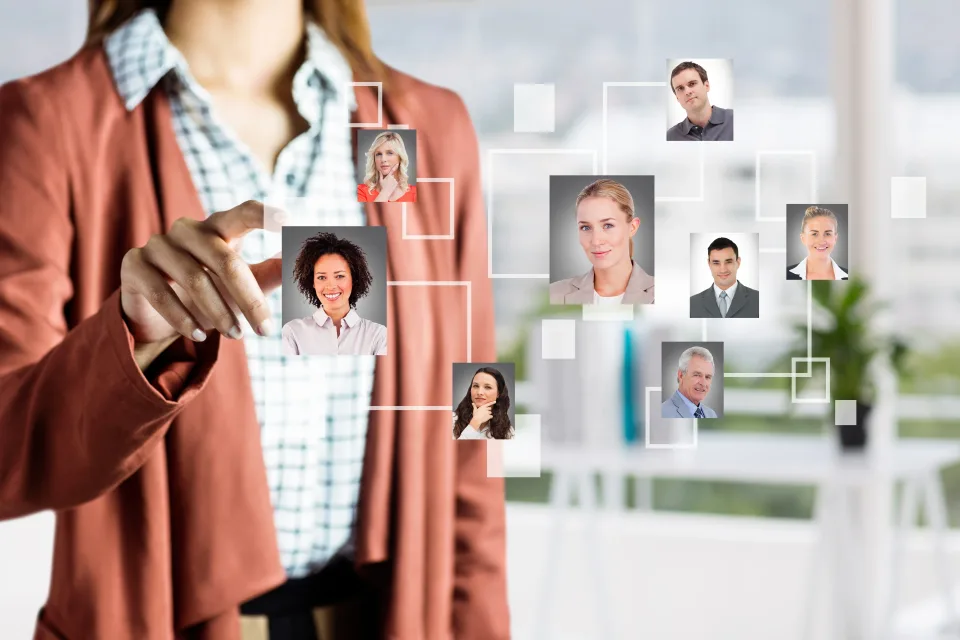 Thumbnail showing floating photos of different people who work at an agency, with a person in the background selecting individuals.